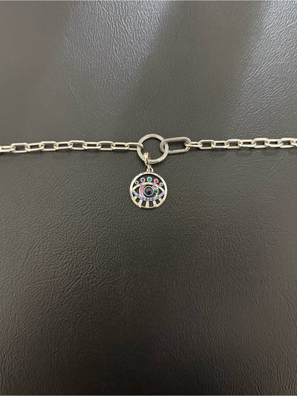 Pandora ME The Eye Medallion charm attached to a link chain bracelet
